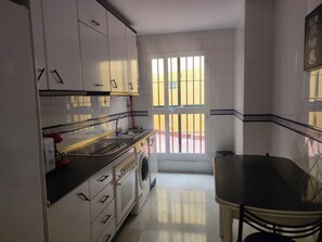 Fridge, microwave, dishwasher, coffee/tea maker - Central Apartment with Private Patio in Seville (Sevilla)