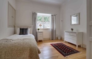 4 bedrooms, iron/ironing board, travel cot, WiFi