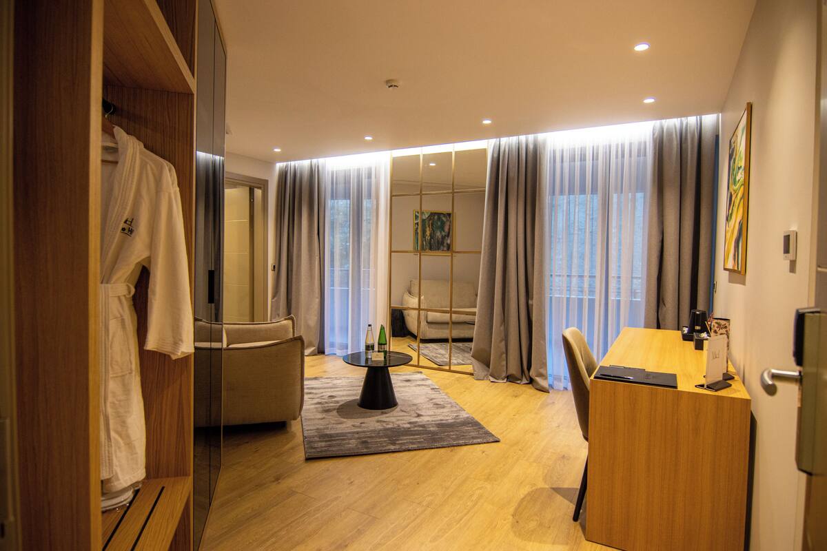 Family Suite | Living area | 50-cm Smart TV with satellite channels