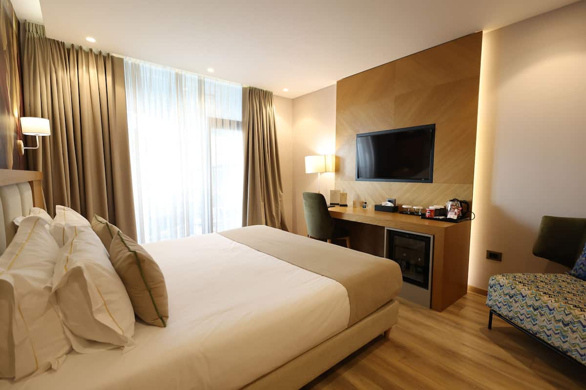 Suite junior | Ropa de cama hipoalergénica, minibar, escritorio y insonorización