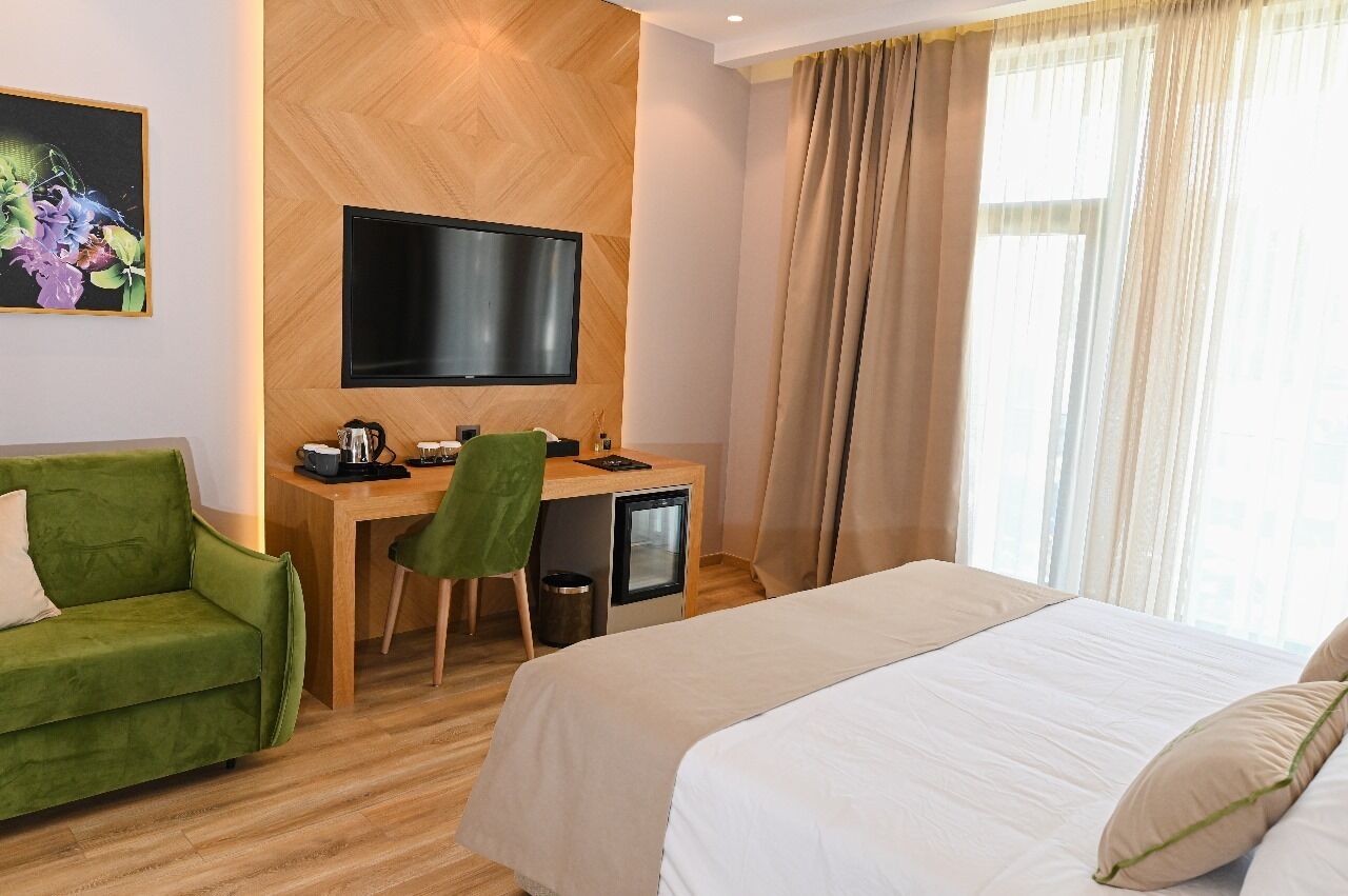 Basic Triple Room, Partial Sea View | Hypo-allergenic bedding, minibar, desk, soundproofing