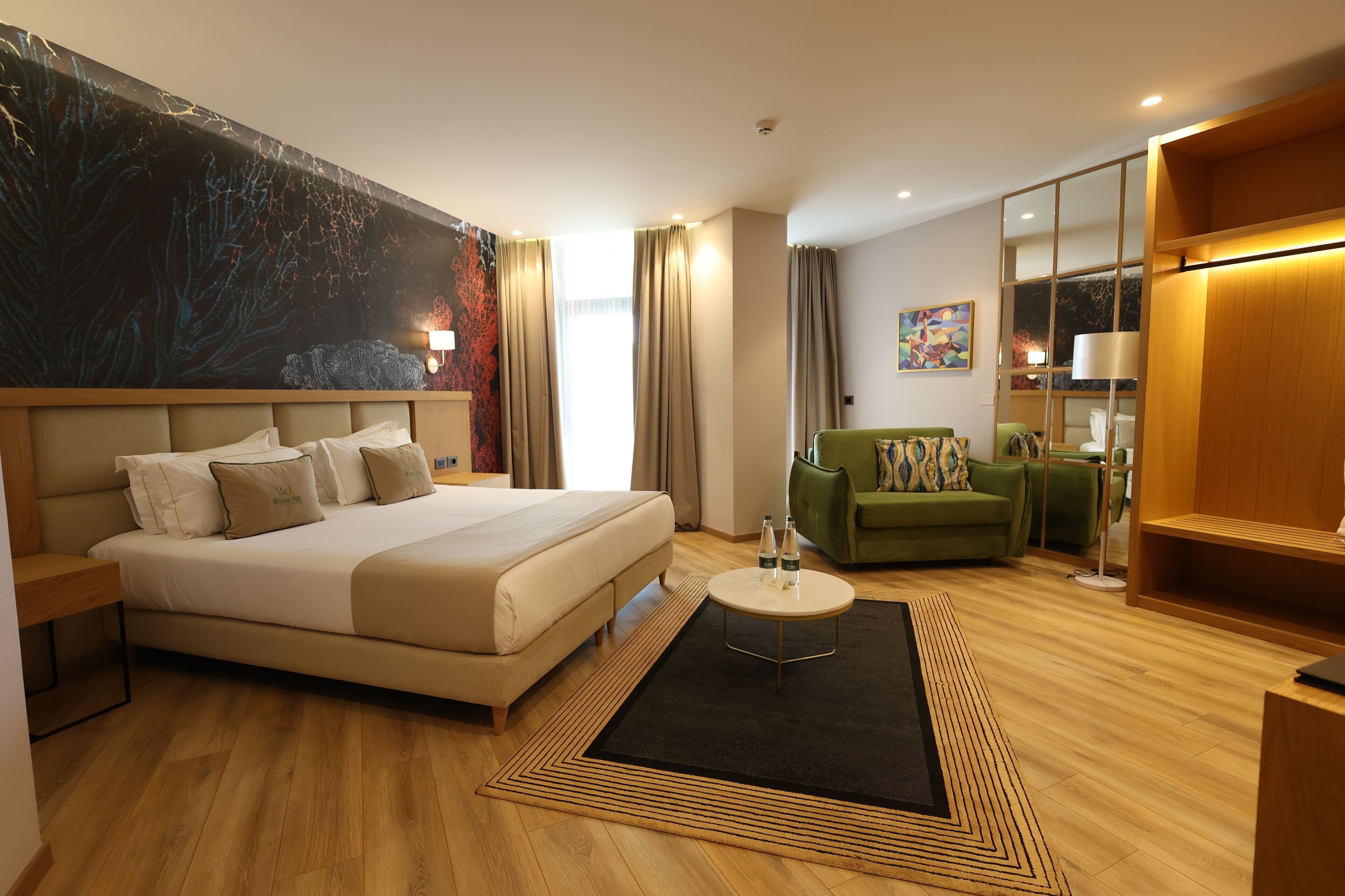 Suite panorámica | Ropa de cama hipoalergénica, minibar, escritorio y insonorización 