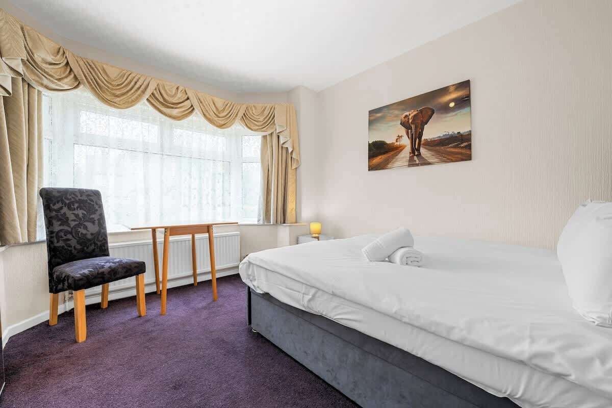 4 bedrooms, desk, iron/ironing board, travel cot