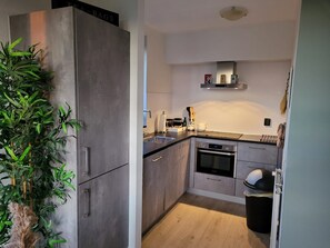 Bungalow | Cocina privada | Trona infantil