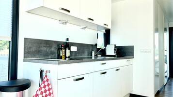 Classic Mobile Home, 2 Bedrooms | Private kitchen | Fridge, oven, dishwasher, coffee/tea maker