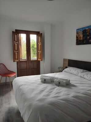 Fer et planche à repasser, draps fournis