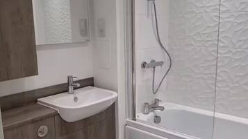 Hair dryer, towels, soap, toilet paper