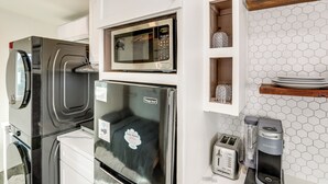 A compact kitchen with a built-in microwave, a toaster, and a coffee maker. - Solo Escape w/ Hot Tub! 10 Mi to Dtwn Sacramento (Rio Linda)