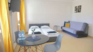 Suite estudio estándar, 1 cama doble con sofá cama, cocina básica | Espacio para trabajar con un portátil y wifi gratis