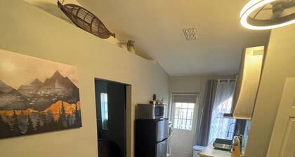 A sleek, fully equipped apartment offering the perfect blend of work & leisure.