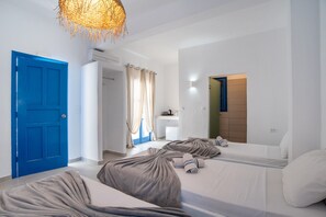 1 bedroom, bed sheets - Economy Quadruple Room 1 with Mountain View, Balcony, and Air Conditioning (Perissa)
