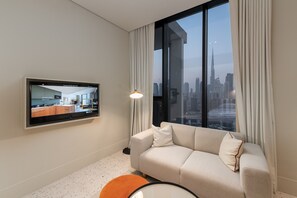 TV, table football - Burj View Studio Near Downtown and Canal (Dubai)