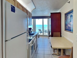 Fridge, microwave, oven, stovetop - Harbour Beach Resort 803 | Pool-View Daytona Beach Condo (Daytona Beach)