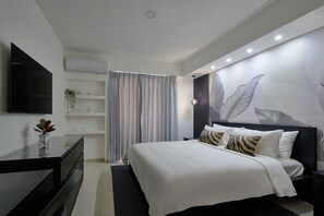 2 habitaciones, tabla de planchar con plancha y ropa de cama 