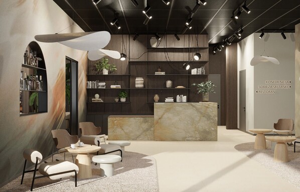 Un interior moderno con un mostrador de recepción, una zona de estar y estanterías con objetos decorativos.