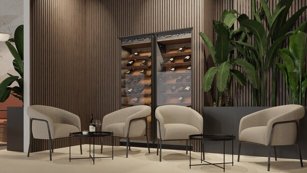 A modern lounge area with seating, a wine rack, and large plants. - Hotel Siscia (Sisak)