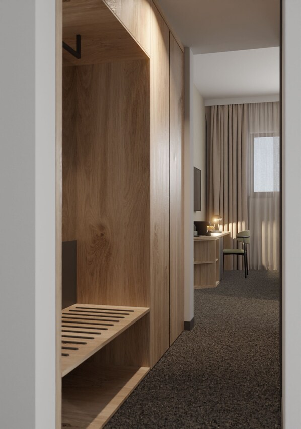 A modern hotel room with a wooden wardrobe, a desk with a lamp, a chair, and a window with curtains. - Hotel Siscia (Sisak)