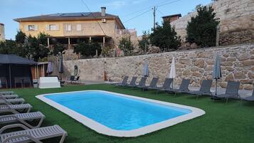 Outdoor pool, pool umbrellas, pool loungers