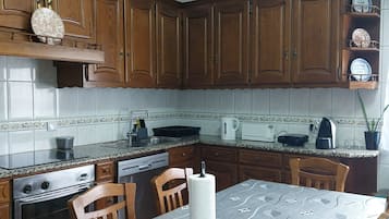 Traditional Apartment, Balcony, Pool View | Private kitchen | Fridge, electric kettle, toaster, high chair