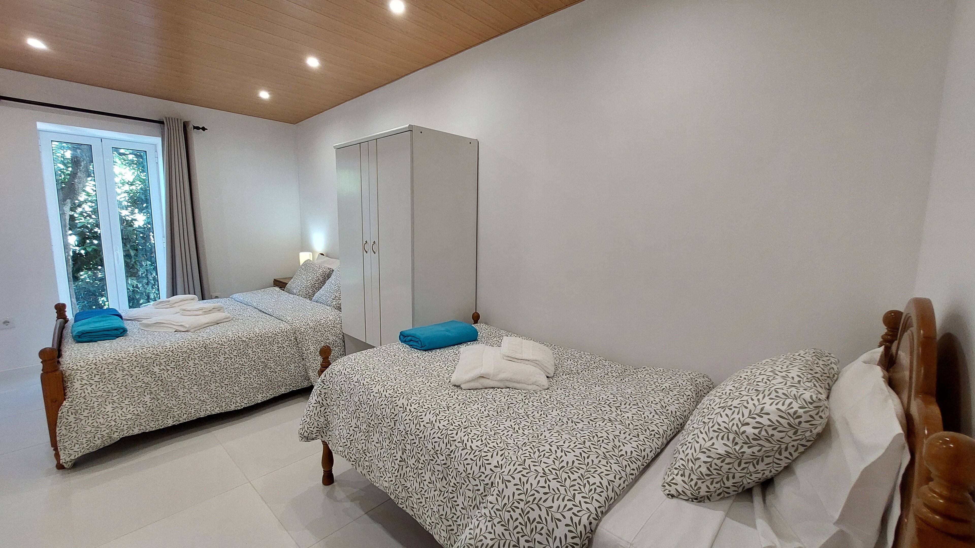 Family Apartment, Garden View | Blackout drapes, iron/ironing board, free WiFi