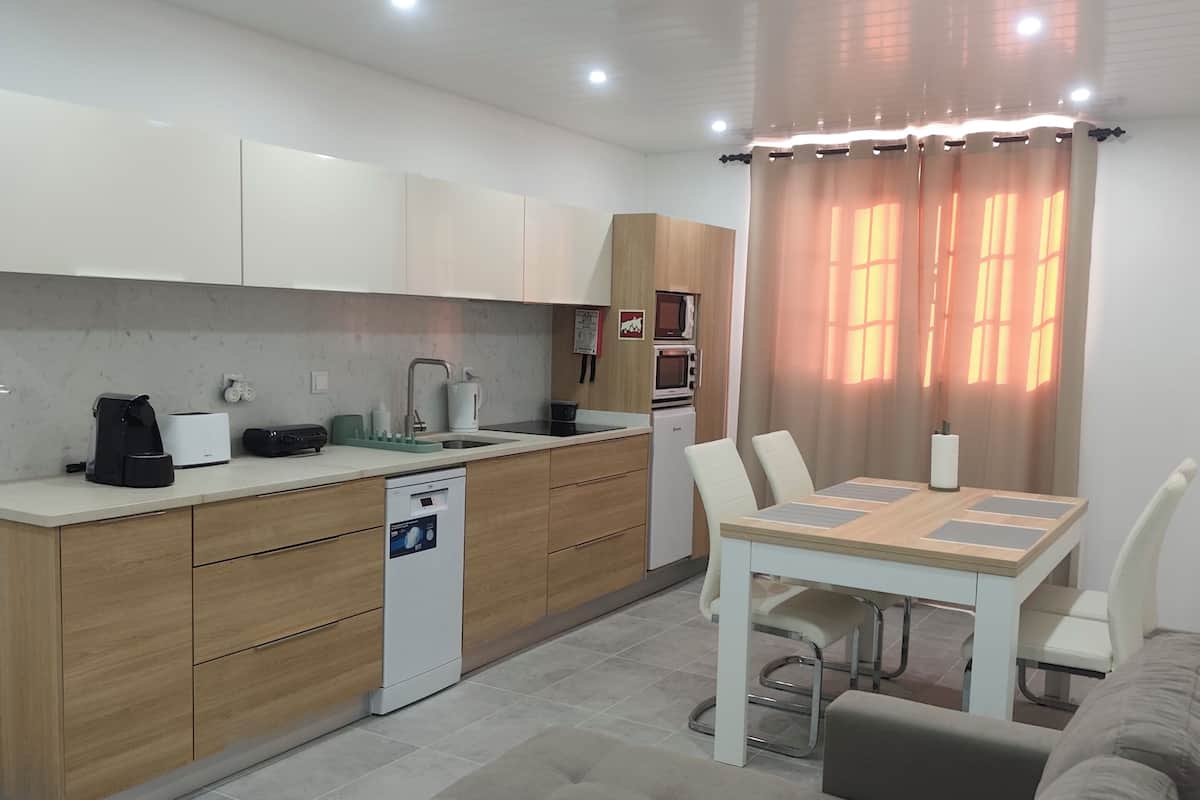 Premium Apartment, Mountain View | Private kitchen | Fridge, highchair