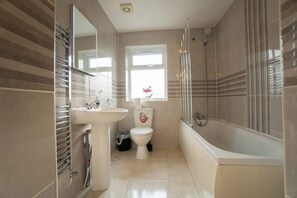 Regadera y secadora de cabello 