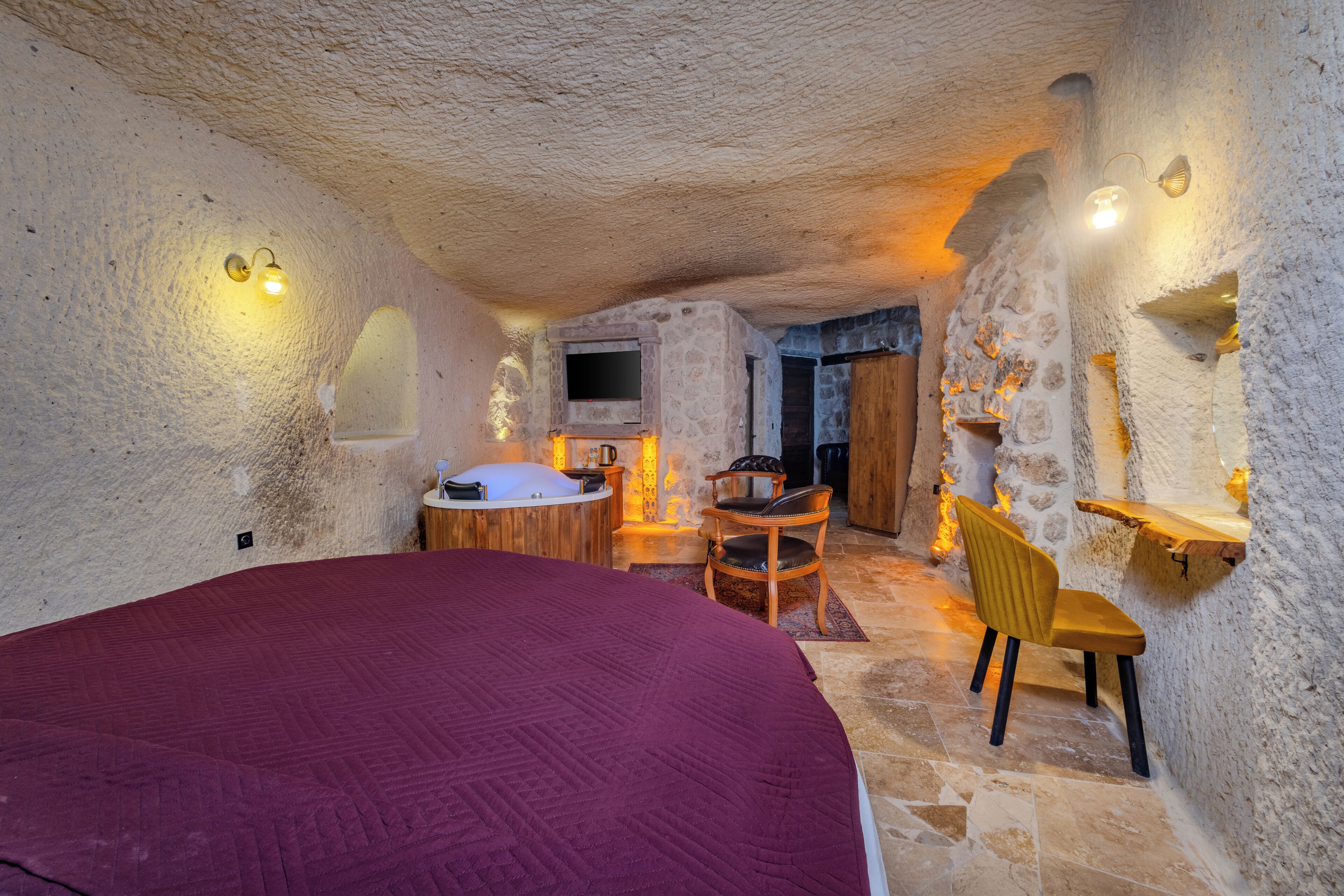 Deluxe-suite | Premium-sengetøj, minibar, individuelt design, individuel indretning