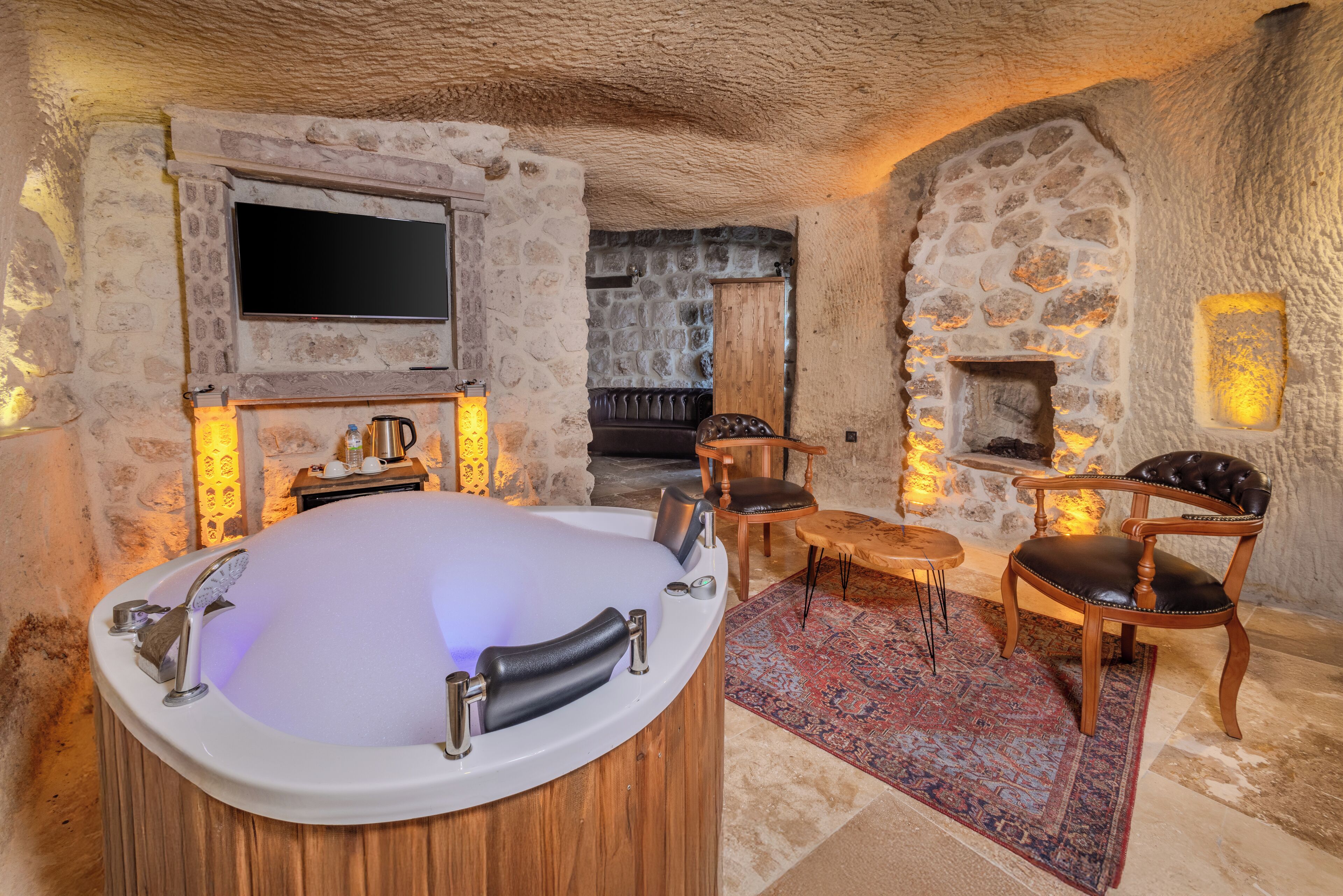 Deluxe-suite | Premium-sengetøj, minibar, individuelt design, individuel indretning