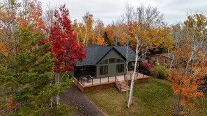 Exterior - Harper House: Bright 3-Bed PEI Retreat with Deck, Firepit & Shared Beach Access (North Rustico)
