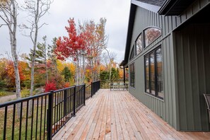 Terrace/patio - Harper House: Bright 3-Bed PEI Retreat with Deck, Firepit & Shared Beach Access (North Rustico)