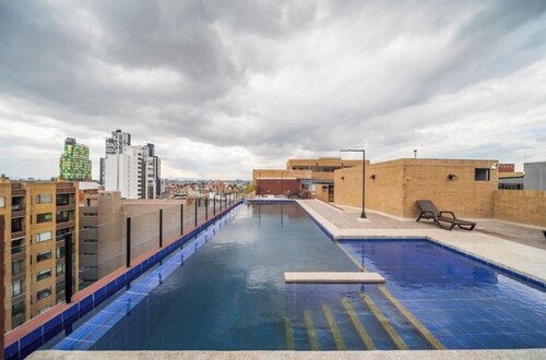 Charming 1-bedroom condo in wonderful Bogotá  with fitness room and heat pool