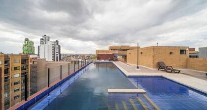 Charming 1-bedroom condo in wonderful Bogotá with fitness room and heat pool