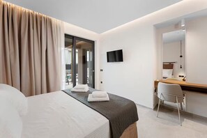 1 bedroom, desk, iron/ironing board, travel crib