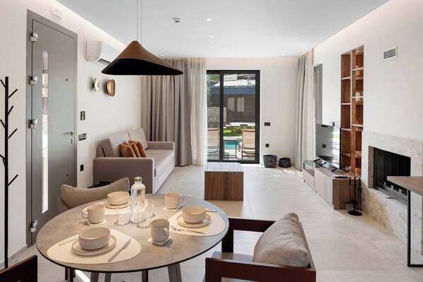 Smart TV, fireplace, books