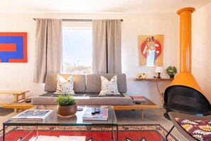 TV, fireplace - Motel California Midcentury Desert Stargazing Escape on 5 Acres (Homestead Valley)