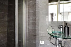 Eco-friendly toiletries, hair dryer, towels, soap
