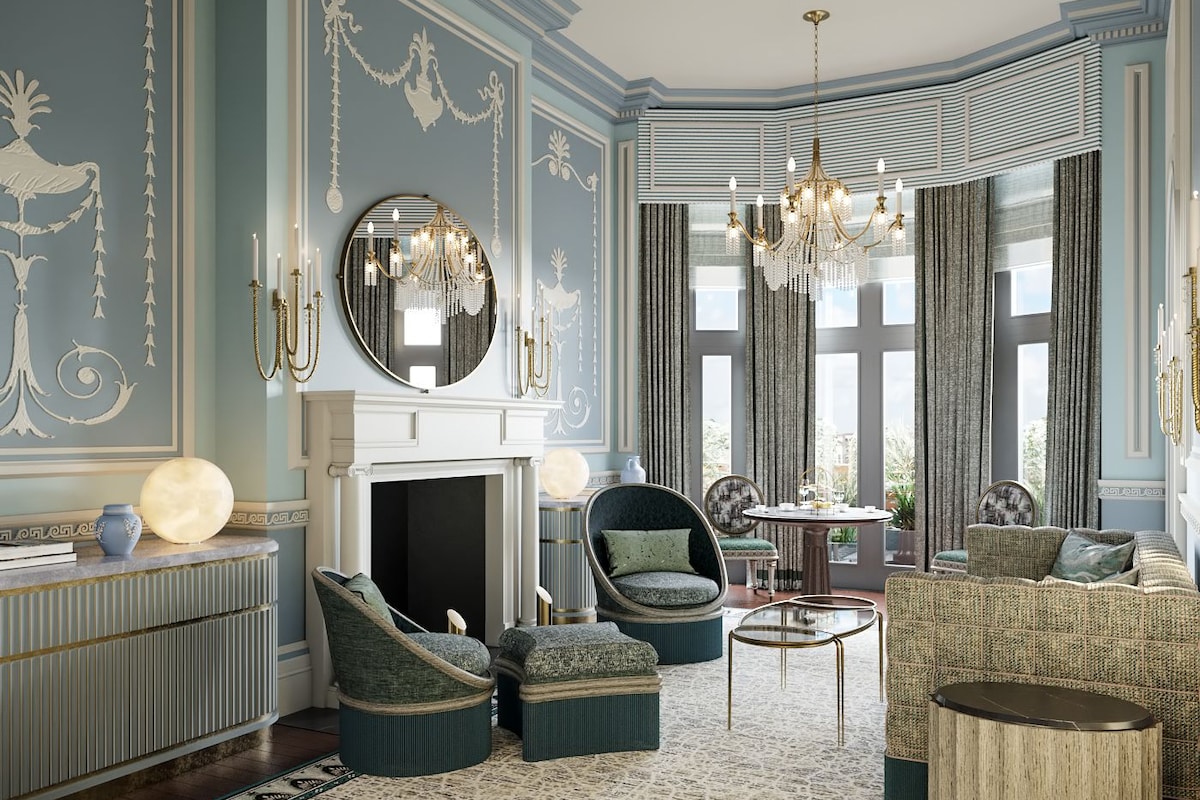 A room with a fireplace, seating area, and large windows with curtains.