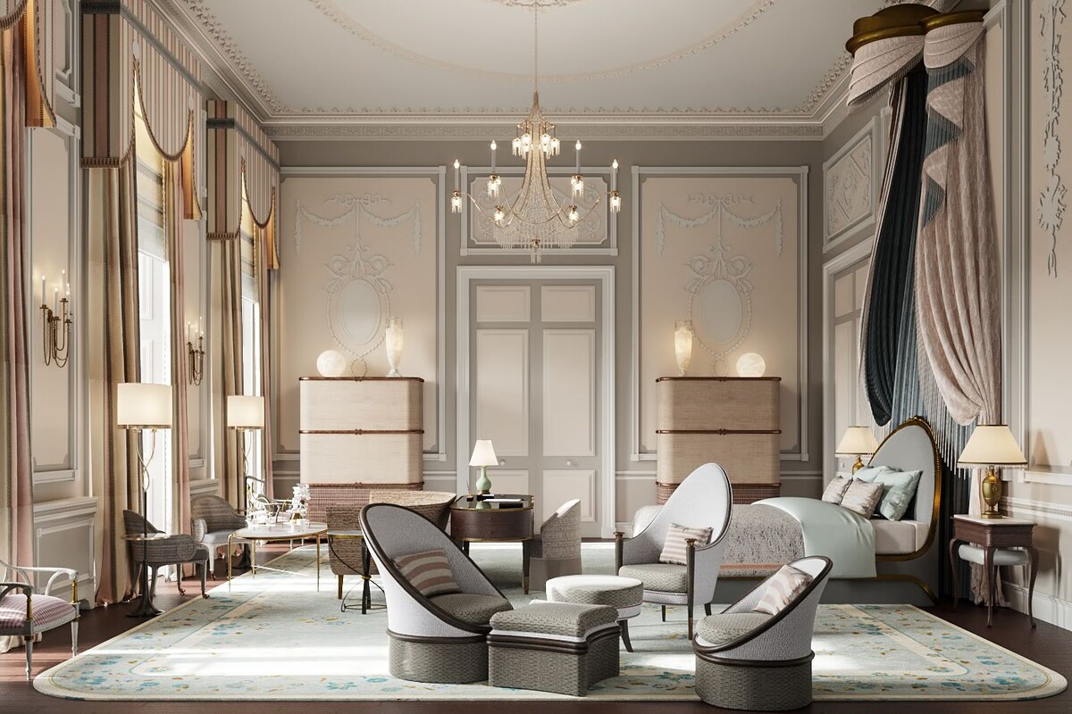 A luxurious bedroom with a large bed, two side tables with lamps, a chaise lounge, a small table, and a chandelier.