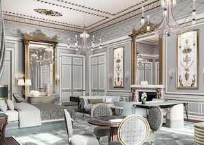 A luxurious room with a grand chandelier, ornate wall decorations, and a fireplace. - Cambridge House, Auberge Collection (London)