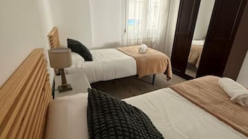 3 habitaciones, tabla de planchar con plancha y wifi gratis