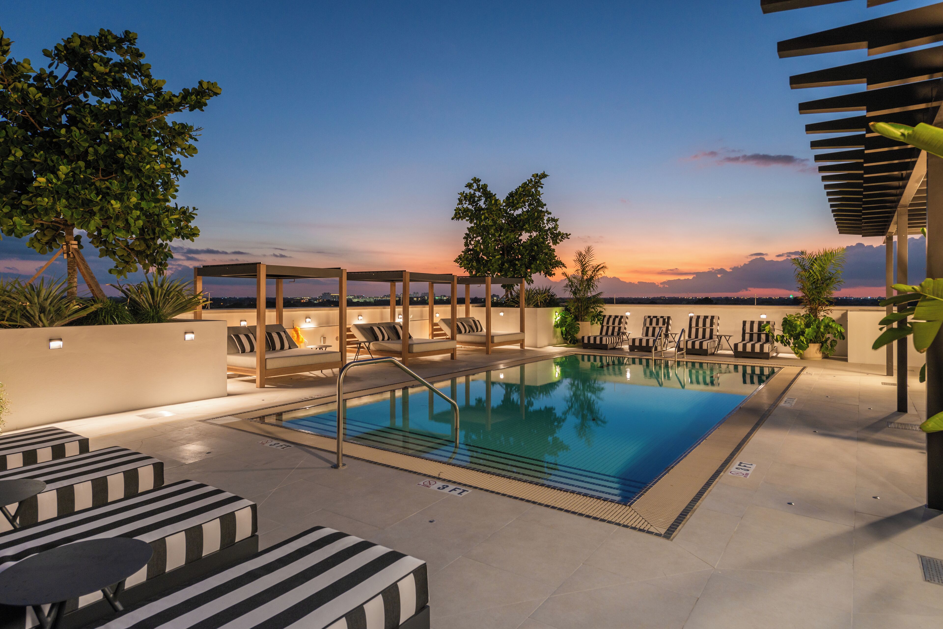 Outdoor pool, open 8:00 AM to 8:00 PM, free cabanas, sun loungers