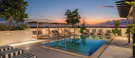 Outdoor pool, open 8:00 AM to 8:00 PM, free cabanas, sun loungers