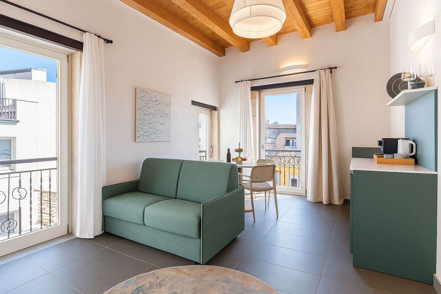Apartment, City View | Living area | 35-inch Smart TV with satellite channels