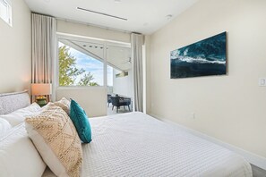 208 - 2 Bedroom Partial Ocean View (2nd Floor) | Iron/ironing board, free WiFi, bed sheets - Point West Premier Rentals (West Bay)
