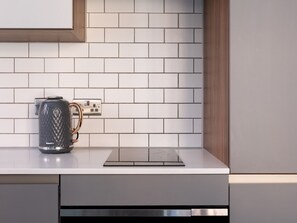 Fridge, oven, toaster, cookware/dishes/utensils