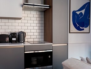 Fridge, oven, toaster, cookware/dishes/utensils