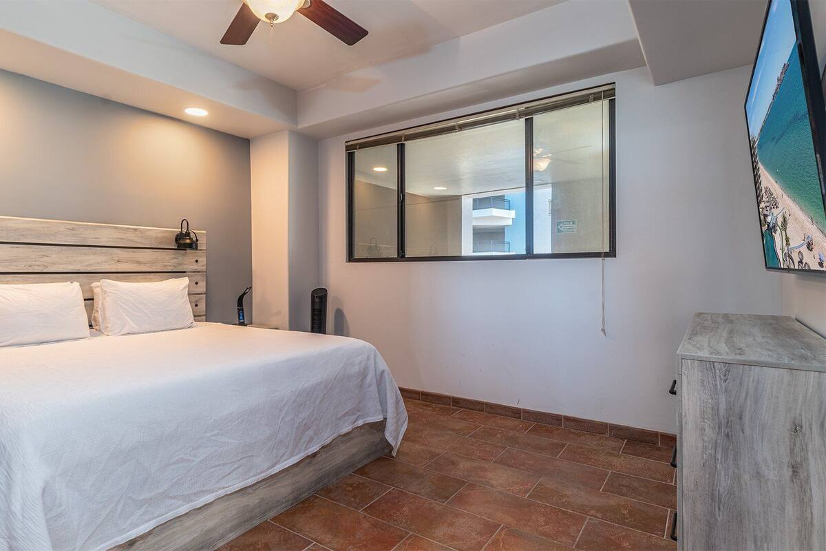 Condo, 1 King Bed with Sofa bed, Balcony, Ocean View (Las Palomas Resort Cristal 906) | 1 bedroom, iron/ironing board, individually decorated