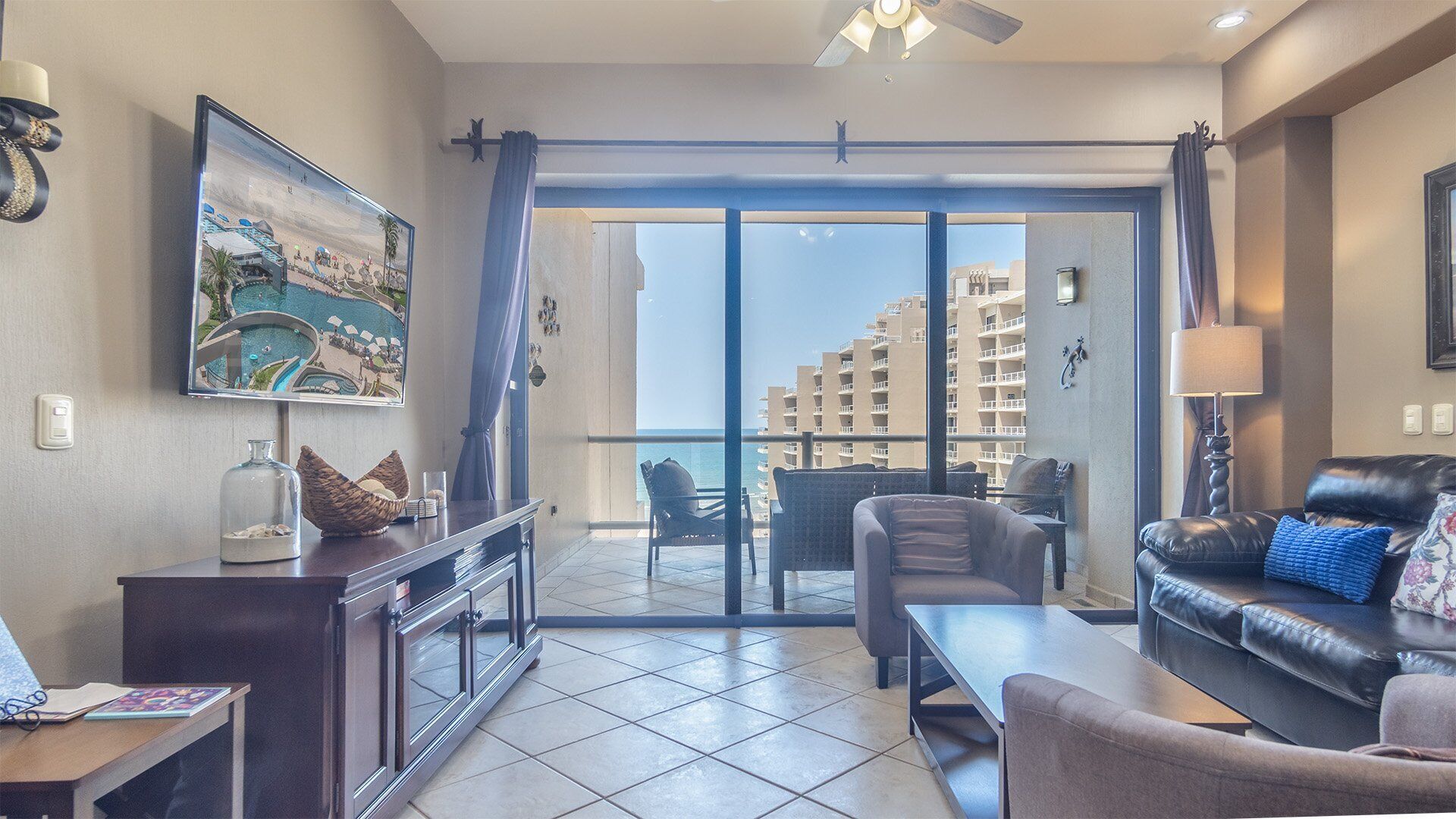 Condo, 1 King Bed with Sofa bed, Balcony, Ocean View (Las Palomas Resort Topaz 706) | Living area | 42-inch flat-screen TV with digital channels