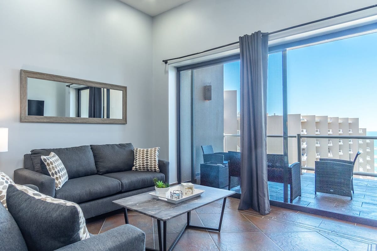 Condo, Multiple Beds, Balcony, Ocean View (Las Palomas Resort Cortez 1502) | Living area | 42-inch flat-screen TV with digital channels