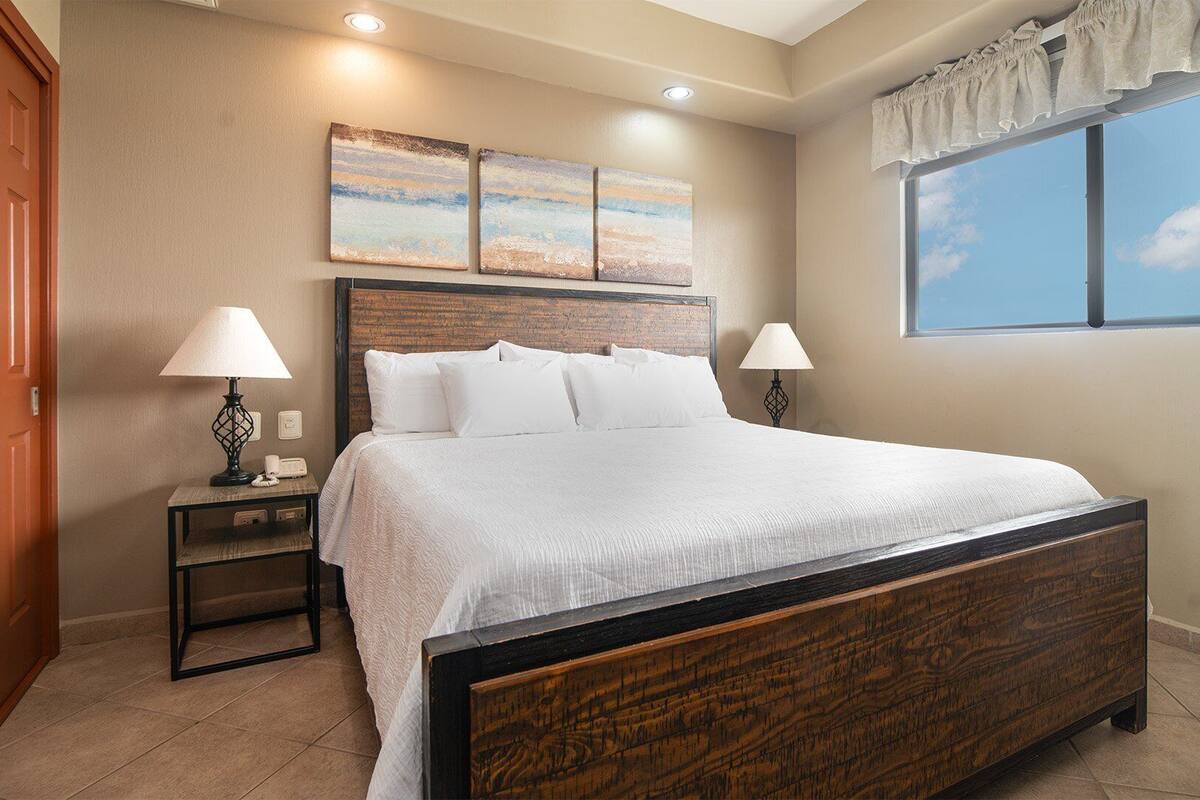 Condo, 1 King Bed with Sofa bed, Balcony, Ocean View (Las Palomas Resort Rubi 1004) | 1 bedroom, iron/ironing board, individually decorated